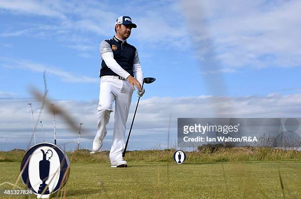 Louis Oosthuizen of South Africa reacts after he hits his tee shot on the 15th hole during the third round of the 144th Open Championship at The Old...
