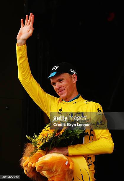 Chris Froome of Great Britain and Team Sky celebrates retaining the overall leaders yellow jersey at the finish of Stage 15 of the Tour de France, a...
