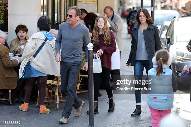 Kiefer Sutherland with his girlfriend and her daughter on vacation on March 29, 2014 in Paris, France.