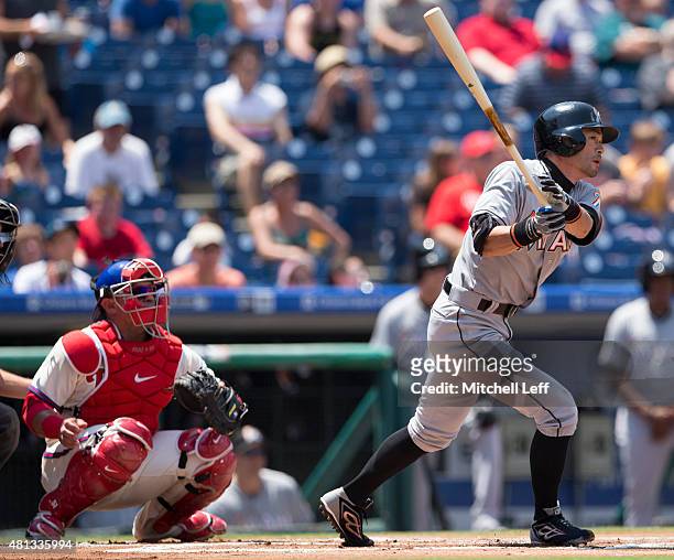 Ichiro Suzuki of the Miami Marlins hits a single in the top of the first inning against the Philadelphia Phillies on July 19, 2015 at the Citizens...