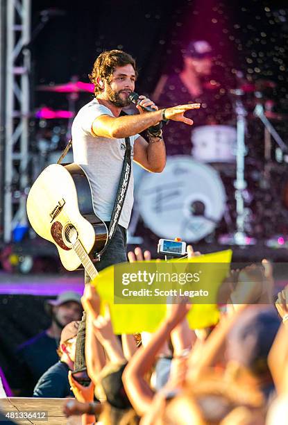 Thomas Rhett performs on day 3 of the Faster Horses Festival at Michigan International Speedway on July 19, 2015 in Brooklyn, Michigan.