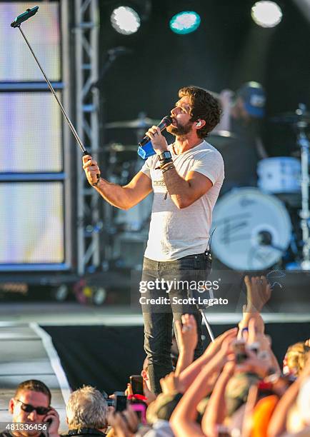 Thomas Rhett performs on day 3 of the Faster Horses Festival at Michigan International Speedway on July 19, 2015 in Brooklyn, Michigan.