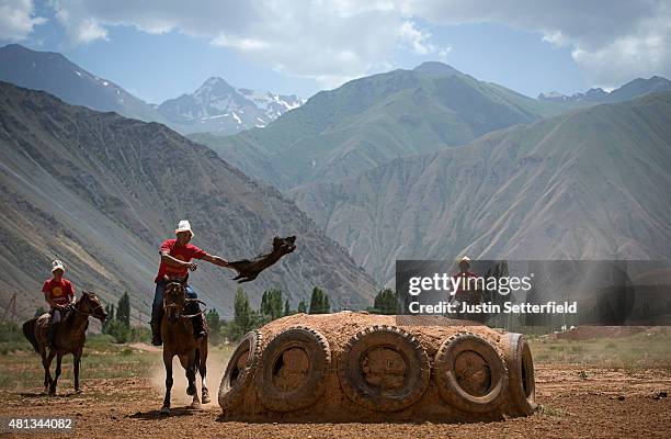 Competitors take part in a game of Kok Boru during the Kyrgyz national horse games on July 18, 2015 in kyzyl-Oi, Kyrgyzstan. The game Kok Boru...