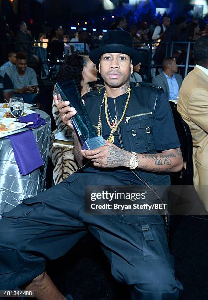 Retired NBA player Allen Iverson poses with the Game Changer Award at The Players' Awards presented by BET at the Rio Hotel & Casino on July 19, 2015...