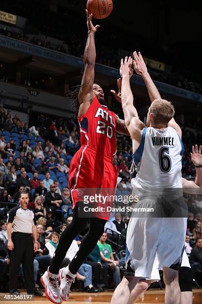 Cartier Martin of the Atlanta Hawks shoots against the Minnesota Timberwolves on March 26, 2014 at Target Center in Minneapolis, Minnesota. NOTE TO...
