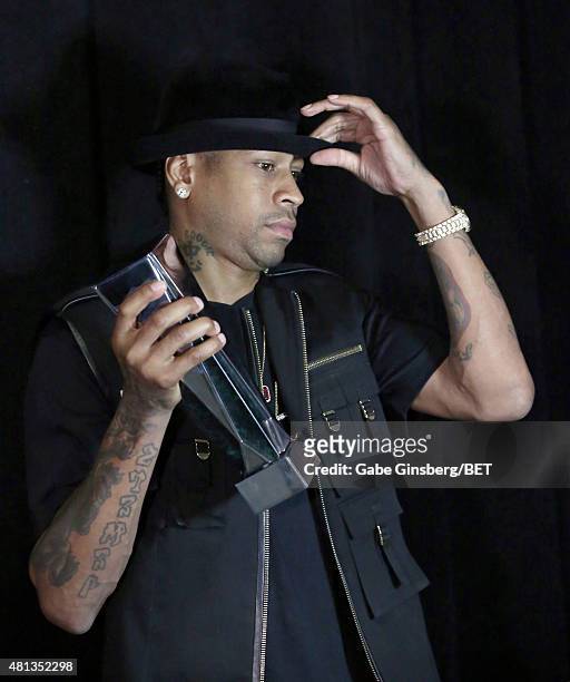 Retired NBA player Allen Iverson poses with the Game Changer Award at The Players' Awards presented by BET at the Rio Hotel & Casino on July 19, 2015...