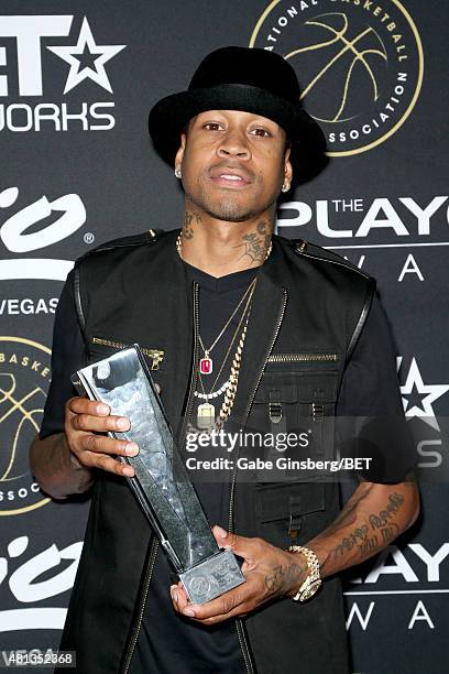 Retired NBA player Allen Iverson poses with the Game Changer Award at The Players' Awards presented by BET at the Rio Hotel & Casino on July 19, 2015...