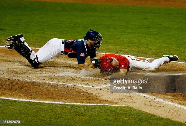 Thomas Murphy of the USA drops the ball as Peter Orr of Canada scores the winning run in the tenth inning making the score 7-6 during their Gold...