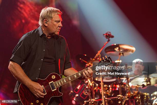 Alex Lifeson and Neil Peart of Rush perform on stage during the R40 LIVE Tour at KeyArena on July 19, 2015 in Seattle, Washington.