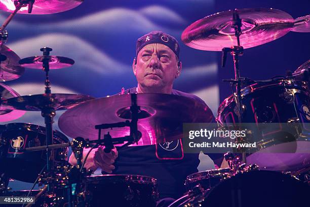 Neil Peart of Rush performs on stage during the R40 LIVE Tour at KeyArena on July 19, 2015 in Seattle, Washington.