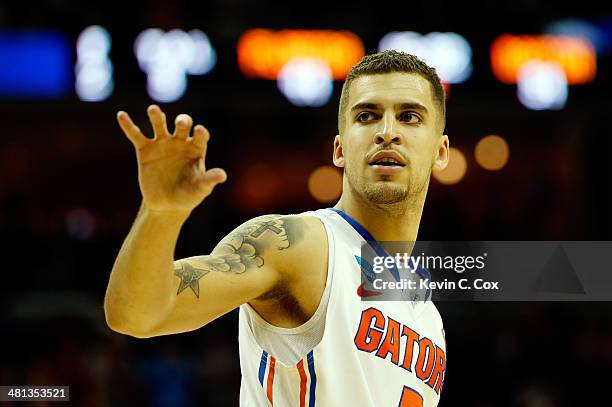 Scottie Wilbekin of the Florida Gators looks on during the south regional final of the 2014 NCAA Men's Basketball Tournament against the Dayton...