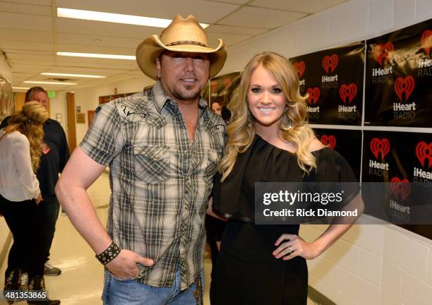 Recording artists Jason Aldean and Carrie Underwood attend iHeartRadio Country Festival in Austin at the Frank Erwin Center on March 29, 2014 in...