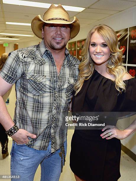 Recording artists Jason Aldean and Carrie Underwood attend iHeartRadio Country Festival in Austin at the Frank Erwin Center on March 29, 2014 in...