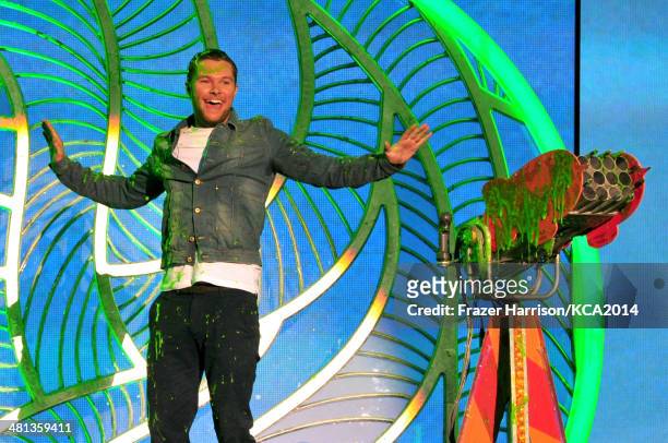 Actor Jack Reynor gets slimed onstage during Nickelodeon's 27th Annual Kids' Choice Awards held at USC Galen Center on March 29, 2014 in Los Angeles,...
