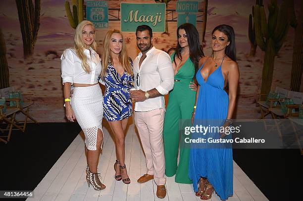 Personalities Alexia Echevarria, Marysol Patton, Shervin Roohparvar, Leila Gharachedaghi, and Golnesa Gharachedaghi attend the Maaji Swimwear fashion...