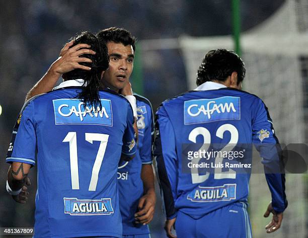 Players of Millonarios celebrate a goal scored during a match between Millonarios and Patriotas FC as part of the Liga Postobon I 2014 at Nemesio...