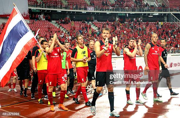 Liverpool players applaud the fans at the end of the international friendly match between Thai Premier League All Stars and Liverpool FC at...