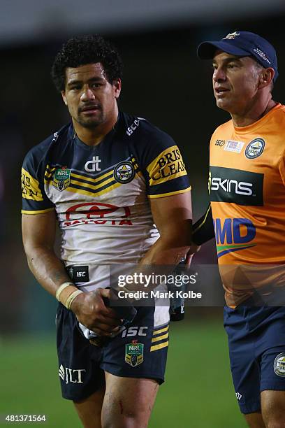 Matthew Wright of the Cowboys leaves the field with a hand injury during the round 19 NRL match between the Manly Sea Eagles and the North Queensland...