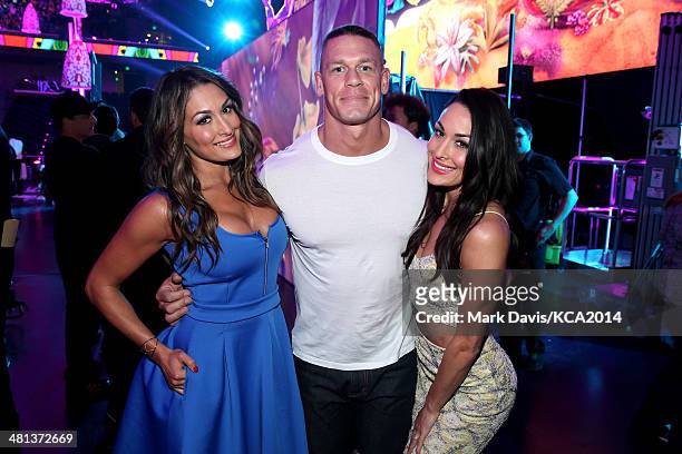 Professional wrestlers Nicole Garcia-Colace, John Cena and Brianna Garcia-Colace backstage at Nickelodeon's 27th Annual Kids' Choice Awards held at...