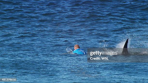 In this screen grab from footage by the World Surf League, Mick Fanning of Australia being attacked by a Shark at the Jbay Open on July 19, 2015 in...