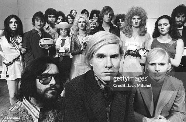 Andy Warhol with the cast of Pork on stage at La Mama Experimental Theatre Club. Jayne County, Cleve Roller and Anthony Zanetta were featured...