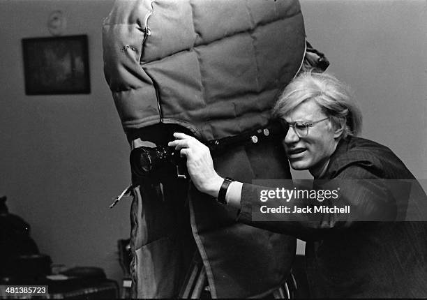 Andy Warhol filming an early scene of director Paul Morriseys Women in Revolt, 1970.