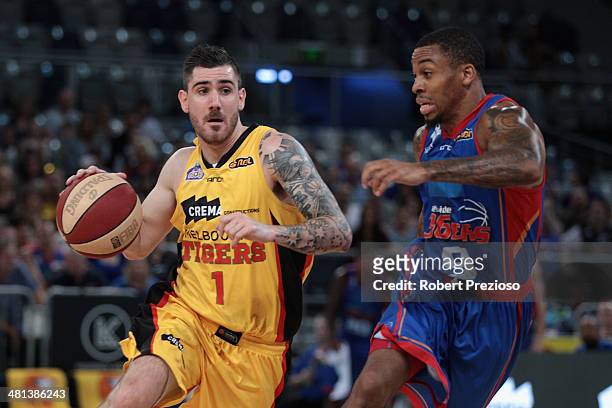 Nate Tomlinson of the Tigers drives to the basket during game two of the NBL Semi Final series between the Melbourne Tigers and the Adelaide 36ers at...
