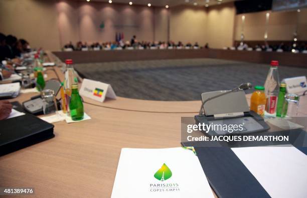 This picture taken in Paris on July 20, 2015 shows the conference room where French Foreign Minister and President of the COP21 Laurent Fabius...