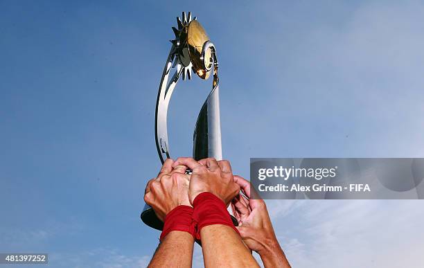 Players of Portugal lift the trophy after winning the FIFA Beach Soccer World Cup Portugal 2015 Final between Tahiti and Portugal at Espinho Stadium...