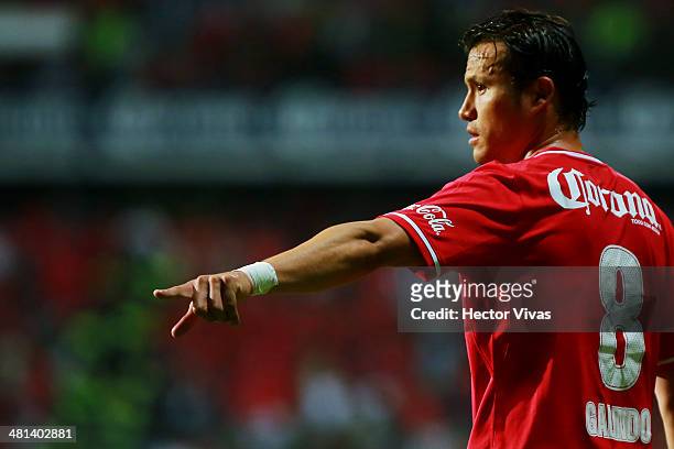 Aaron Galindo of Toluca points during a match between Toluca and Tigres UANL as part of the 13th round of Clausura 2014 Liga MX at Nemesio Diez...