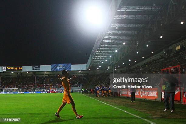 Jose Francisco Torres of Tigres celebrates the first scored goal of his team during a match between Toluca and Tigres UANL as part of the 13th round...