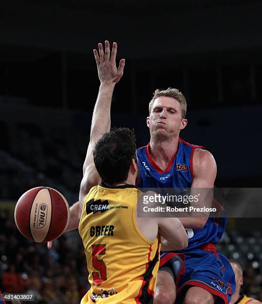 Rhys Carter of the 36ers makes a pass during game two of the NBL Semi Final series between the Melbourne Tigers and the Adelaide 36ers at Hisense...