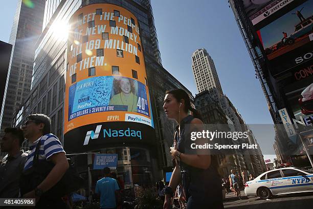 PayPal advertisment is viewed on the Nasdaq prompter after President and CEO Dan Schulman joined employees, customers and Nasdaq employees to ring...