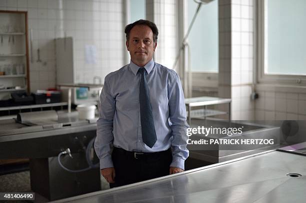 Jean-Sebastien Raul, director of the Strasbourg forensic medicine institute, poses on July 20, 2015 inside an autopsy room in the institute in...