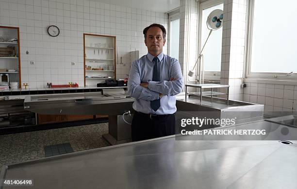 Jean-Sebastien Raul, director of the Strasbourg forensic medicine institute, poses on July 20, 2015 inside an autopsy room in the institute in...