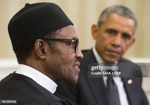 President Barack Obama meets with Nigerian President Muhammadu Buhari in the Oval Office of the White House in Washington, DC, July 20, 2015. Obama...