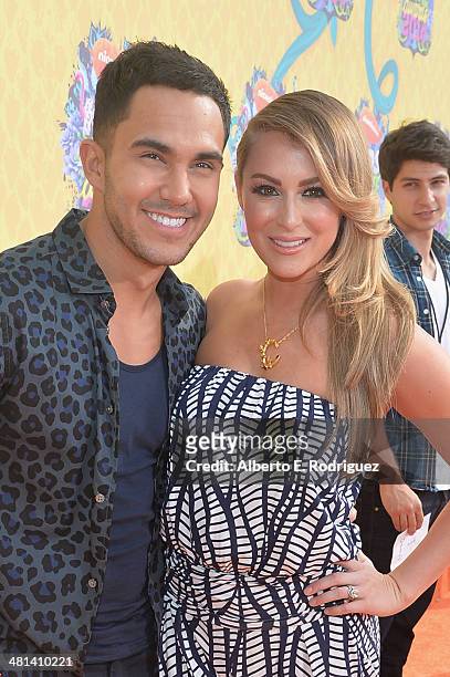 Actors Carlos Pena Jr. And Alexa PenaVega attend Nickelodeon's 27th Annual Kids' Choice Awards held at USC Galen Center on March 29, 2014 in Los...