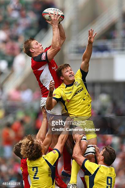 John Moonlight of Canada contests a lineout with Cameron Clark of Australia during the Cup quarter-final match between Australia and Canada during...