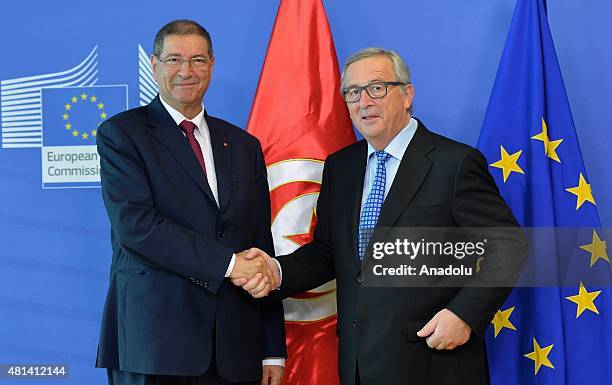 Prime Minister of Tunisia Habib Essid is welcomed by European Commission President Jean Claude Juncker prior to a meeting at the European Commission...