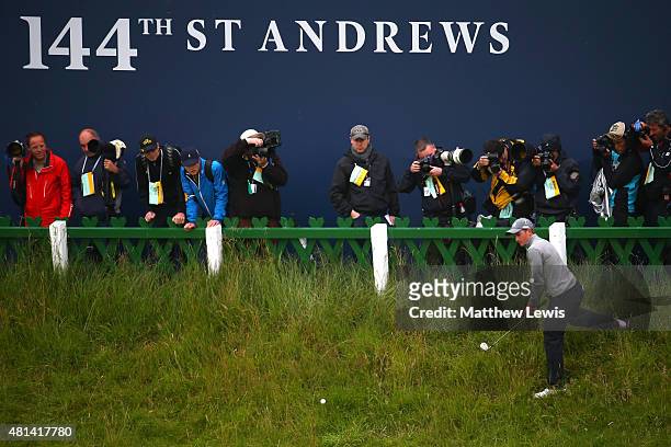 Amateur Paul Dunne of Ireland plays a shot from the the edge of 18th green during the final round of the 144th Open Championship at The Old Course on...