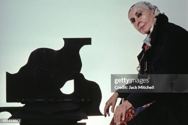 Sculptor Louise Nevelson photographed in her New York City studio in 1983.