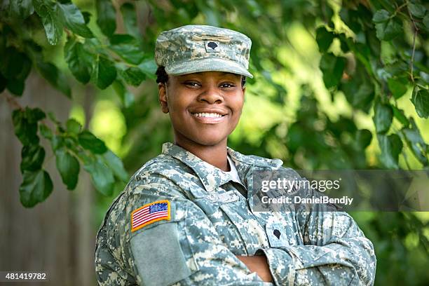 female american soldier - people in military uniform stock pictures, royalty-free photos & images