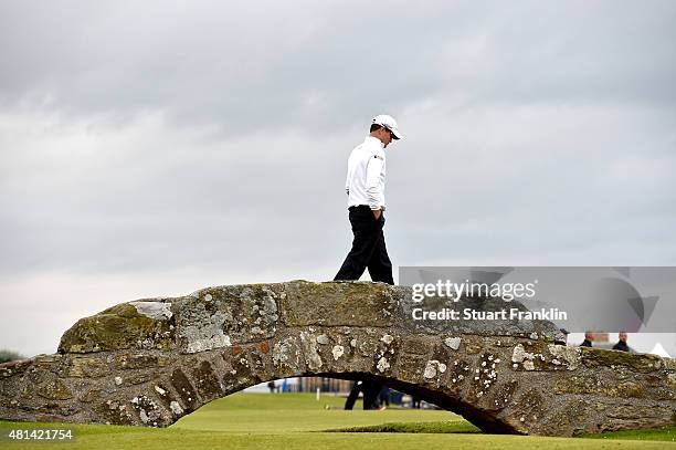 Zach Johnson of the United States walks over the Swilcan Bridge on the 18th hole in the playoff during the final round of the 144th Open Championship...