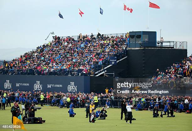 Zach Johnson of the United States plays his approach shot to the 18th hole in the playoff during the final round of the 144th Open Championship at...