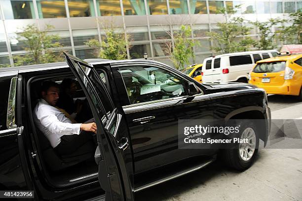 An Uber vehicle is viewed in Manhattan on July 20, 2015 in New York City. New York's City Council has proposed two bills last month to limit the...