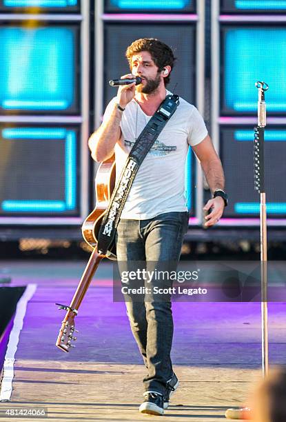 Thomas Rhett performs on day 3 of the Faster Horses Festival at Michigan International Speedway on July 19, 2015 in Brooklyn, Michigan.