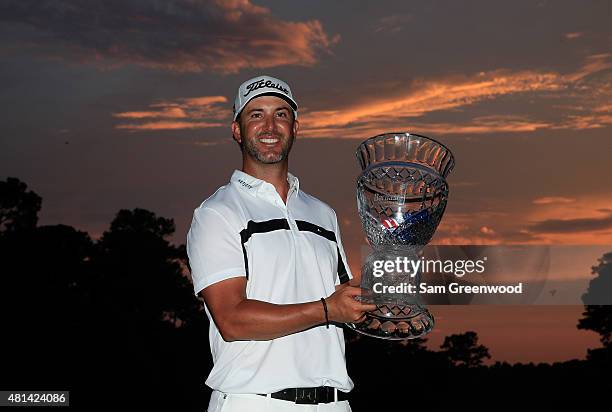 Scott Piercy of the United States poses with the trophy after winning the Barbasol Championship at the at the Robert Trent Jones Golf Trail Grand...