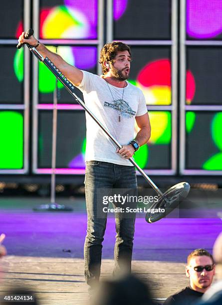 Thomas Rhett performs on day 3 of the Faster Horses Festival at Michigan International Speedway on July 19, 2015 in Brooklyn, Michigan.