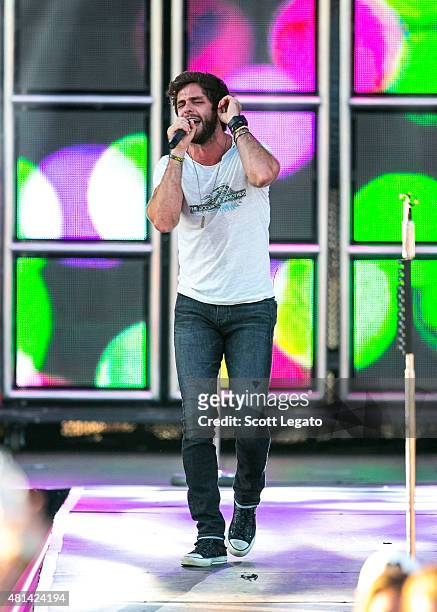 Thomas Rhett performs on day 3 of the Faster Horses Festival at Michigan International Speedway on July 19, 2015 in Brooklyn, Michigan.