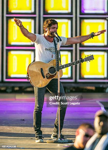 Thomas Rhett performs on day 3 of the Faster Horses Festival at Michigan International Speedway on July 19, 2015 in Brooklyn, Michigan.